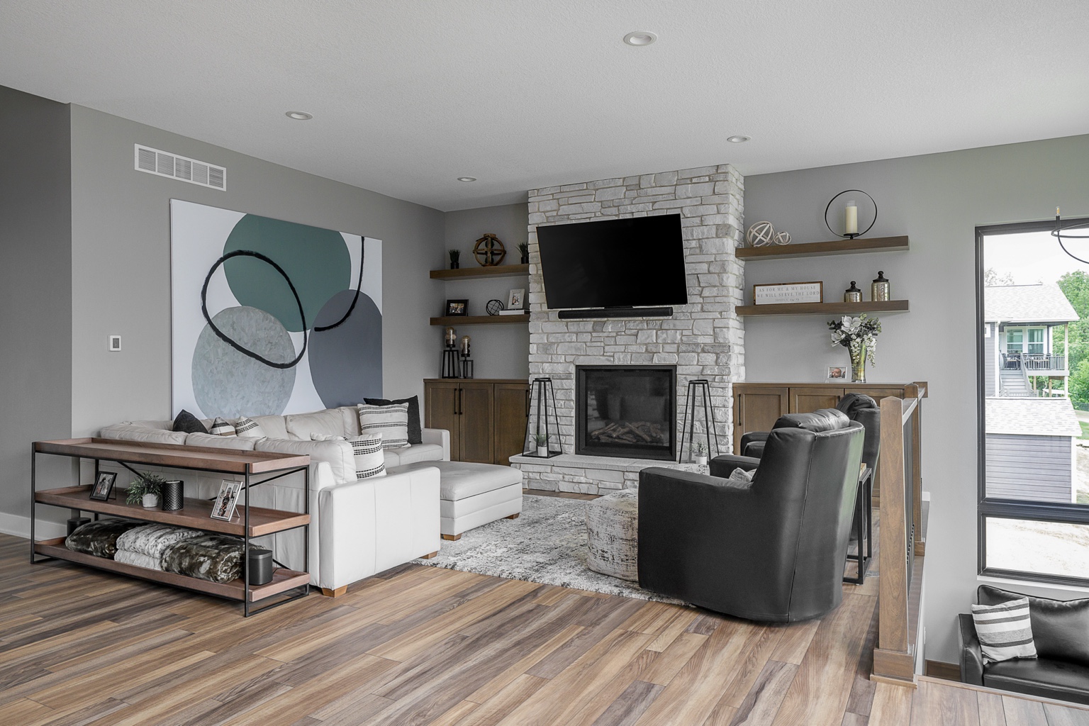 Custom living room with stone fireplace